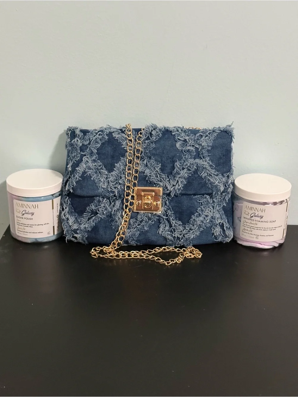 Aminnah Bundle includes: Frayed Denim crossbody bag and 2 Aminmah products! New